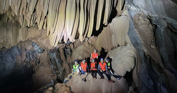 Discovering a new cave with an underground river flowing through